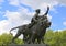 London, Great Britain -May 23, 2016: The Victoria Memorial, bronze figure with lion, representing Progress