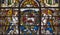 LONDON, GREAT BRITAIN - SEPTEMBER 14, 2017: The angels and the Lamb of God on the stained glass in church