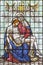 LONDON, GREAT BRITAIN - SEPTEMBER 16, 2017: The Pieta on the stained glass in St Clement Danes from 20. cent