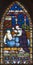 LONDON, GREAT BRITAIN - SEPTEMBER 19, 2017: The Raising of Tabitha on the stained glass in St Mary Abbot`s church