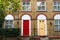 London house traditional brick wall facade and doors, UK