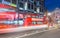 LONDON - JUNE 14, 2015: Red Double Decker Bus speeds up in city