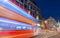 LONDON - JUNE 14, 2015: Red Double Decker Bus speeds up in city