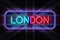 London neon sign on a Dark Wooden Wall 3D illustration with Union Jack background