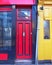 London, Notting hill, colorful entrance with red and yellow doors