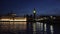 London Parliament Palace of Westminster, Big Ben clock tower and Westminster Bridge reflected in Thames by night