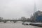 London river fog bridge bank center