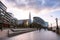 London riverside walkway in warm sunset light