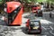 London road traffic, double decker buses and traditional taxi, traditional vehicles of London city.