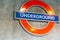 LONDON - SEPTEMBER 25, 2016: Underground symbol outside of subway station. The London Underground logo is one of the most