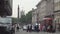 London street image with double-decker red bus jam traffic and people walking