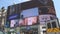 London Street Image with People Walking Thru a Bus Station in Downtown