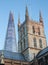 London - The top of Shard tower and tower of Southwark cathedral in evening light