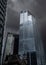 London, UK: 22 Bishopsgate reflecting the sky against a backdrop of dark, swirling storm clouds