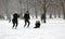 London, uk, 2nd march 2018 - Green Park covered in snow as comuters walk to work beast from the east meets storm sally