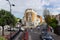 London, UK - 30 July, 2018: View on London`s street Woodstock Grove with parked cars, rental bikes and people