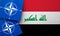 LONDON, UK - August 2022: NATO North Atlantic Treaty Organization military alliance logo on a Iraq flag