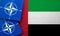 LONDON, UK - August 2022: NATO North Atlantic Treaty Organization military alliance logo on a UAE flag