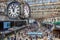 London, UK - The Clock and the People in the Late Morning inside the Waterloo Station in London