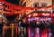 London, UK/Europe; 20/12/2019: Night view of a Chinatown street with red chinese lanterns, neon sign and wet floor in the district