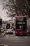 London UK February 2021 Cold vertical winter shot of a number 40 London bus waiting on an intersection, going to Dutwitch library