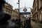 London UK January 2021 Entrance to the Westminster underground tube station. Cold winter day, union jack flag in the background.