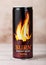 LONDON, UK - JUNE 30, 2018: Can of Burn Energy Drink Original on wood. Burn energy is made for keeping eyes open and mind sharp.