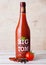 LONDON, UK - MARCH 10, 2018 : Glass bottle of Big Tom spiced tomato mix on wood.A powerful blend of spices to make the ultimate B