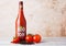 LONDON, UK - MARCH 10, 2018 : Glass bottle of Big Tom spiced tomato mix on wood.A powerful blend of spices to make the ultimate B