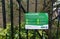 London, United Kingdom - April 03, 2020: Virus prevention advice safety sign on fence in Lewisham park due to coronavirus covid-19