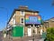 London, United Kingdom - April 20, 2020: Light Ad display with SHN Stay Home Now, play on words NHS with rainbow background