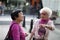 London, United Kingdom- June 2019: Street Photography: Asian Elderly Ladies Talking in Soho, London - Chinatown