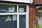 London, United Kingdom - May 04, 2020: Children made hand painted rainbows displayed on window of house in Lewisham as sign of