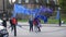 London, United Kingdom - October 20, 2017: Group of people striking against BREXIT, passing by black cabs, 4k. London, UK