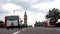 London Westminster Palace, Big Ben View, Heavy Traffic Street with Red Buses