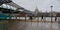 London in the winter rain. Millennium Bridge & St Paul`s Cathedral