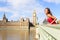 London woman on Westminster Bridge by Big Ben