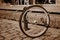 A lone bicycle wheel in a street