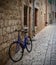 Lone blue bicycle in Starigrad street