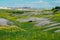 Lone Buffalo grazing in the Badlands of South Dakota, horizontal