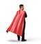 A lone businessman in red flowing cape in side 45 degrees view on white background.