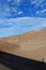 Lone Climber in the Sand Dunes