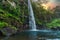 Lone creek falls in bond below during colorful sunset  in Sabie