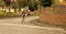 A lone cyclist struggles to catch up with the leaders.