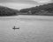 Lone fly fisherman on Ladybower Reservoir.