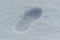 lone footprint or boot on the snow the next person