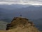 Lone hiker enjoying backcountry nature landscape mountain panorama at Bell Rock lookout in Tutira Hawkes Bay New Zealand