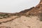 A Lone Hiker Exploring Wadi Ardon in the Ramon Crater in Israel