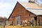 Lone Horse Grazes On Feed Farm Ranch Barn Corral