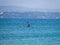 Lone kayaker in perfect blue sea